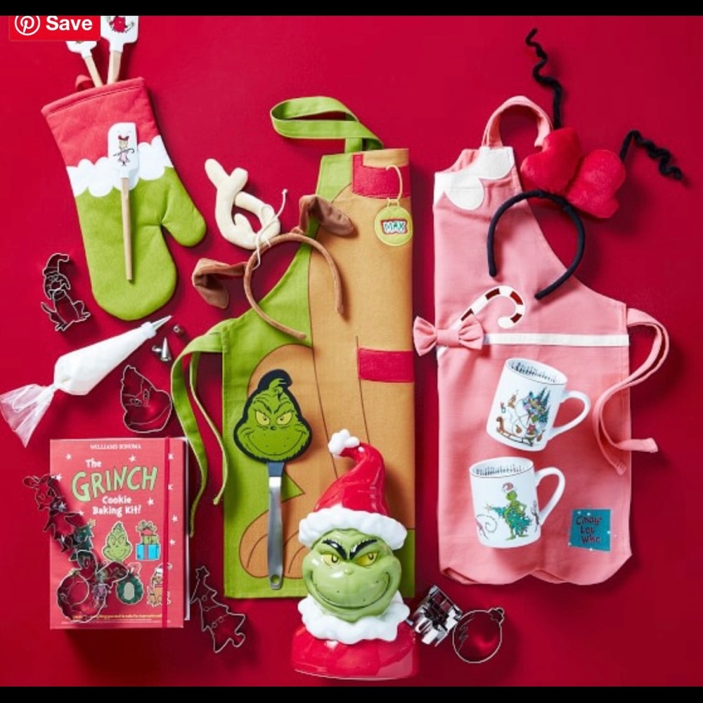 2 Grinch aprons brand NEW in original packaging.WILLIAM SONOMA.Kids sized aprons